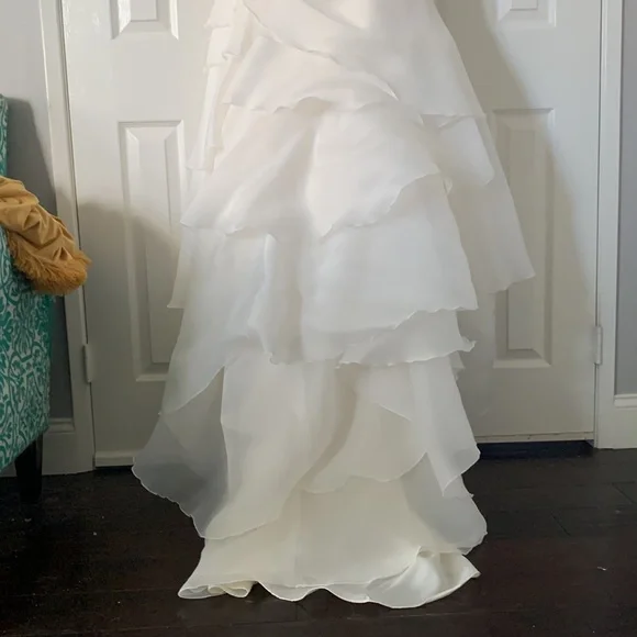 Beautiful off white Demtria cascading wedding dress.  Size 10, but altered. - Picture 9 of 12
